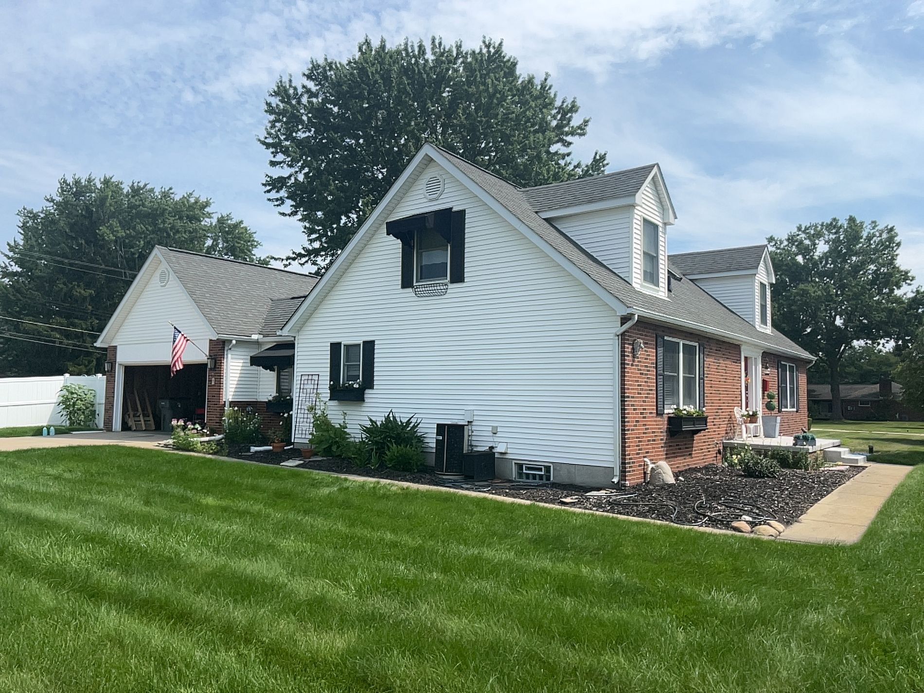 A Before image of a siding installation in Clinton Township MI on Faulman Road