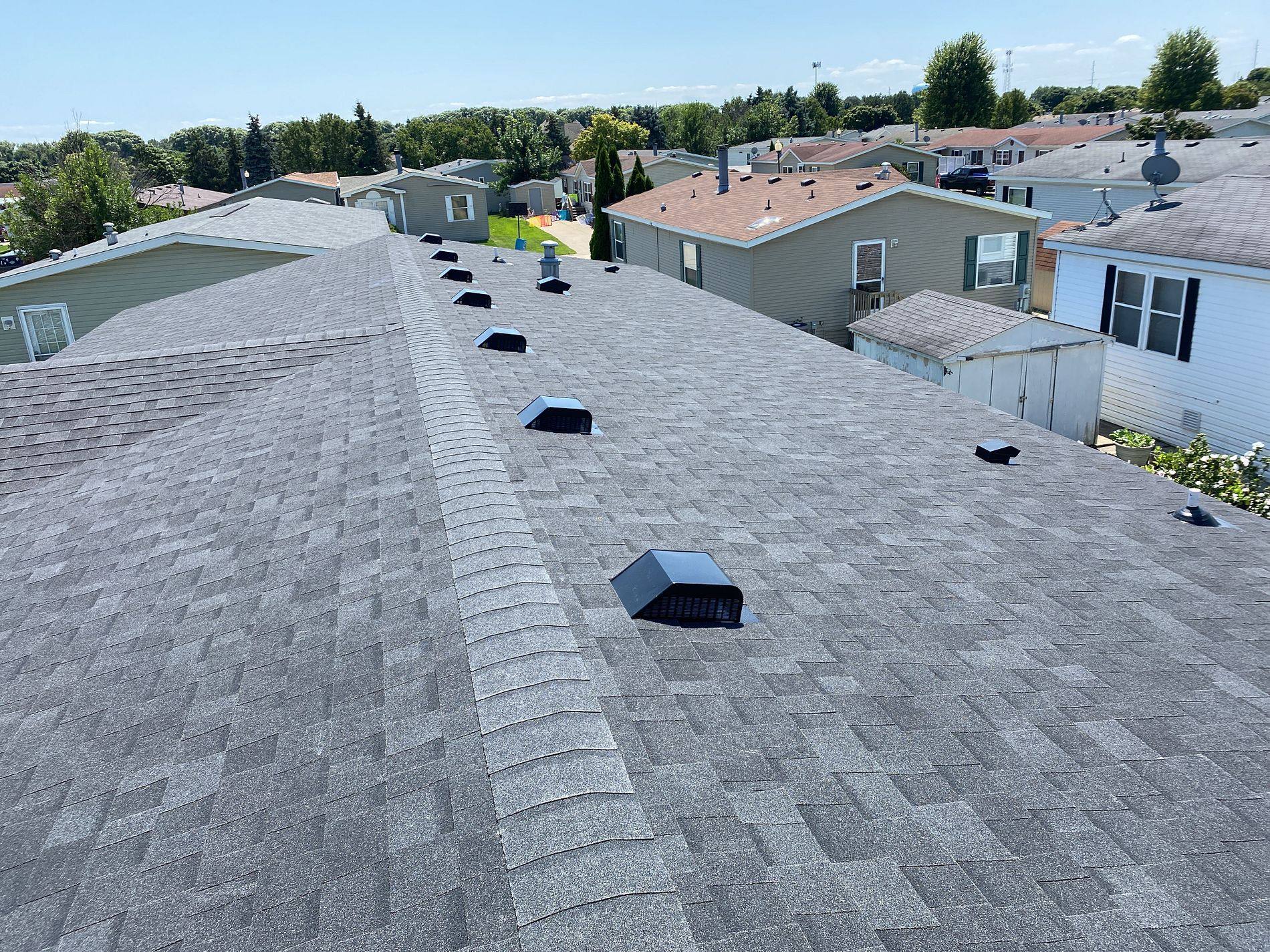 New asphalt shingle roof installed by Rock Solid Exteriors