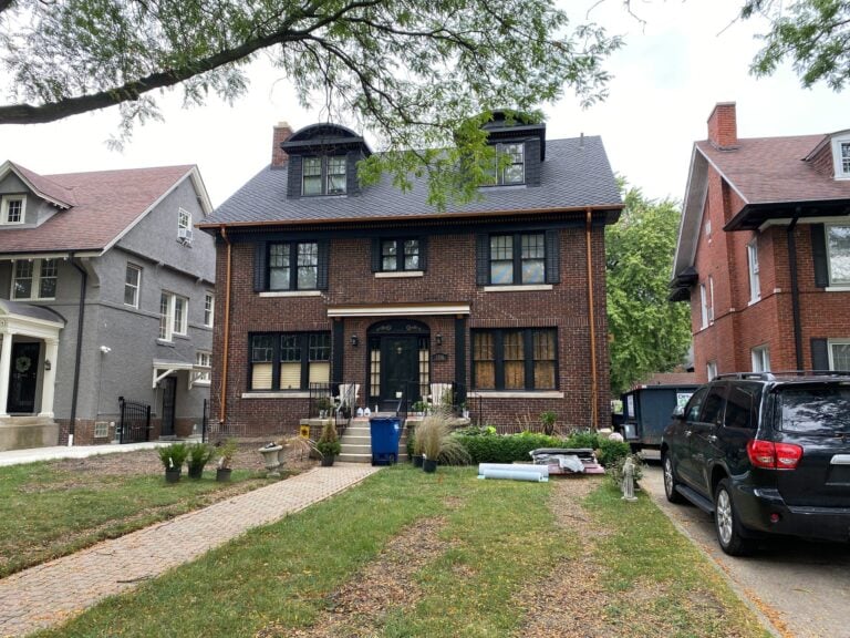 Two-story brick home on Chicago Boulevard in Detroit, MI, site of a Rock Solid Exteriors concrete project